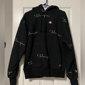 NWOT Men’s Champion Large Black Hoodie with White logo design.